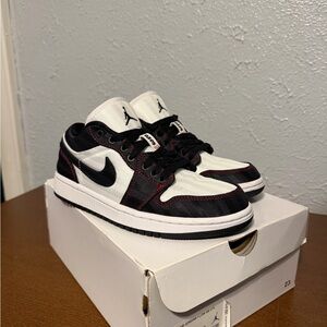 Black and White Sneakers with Red Accents